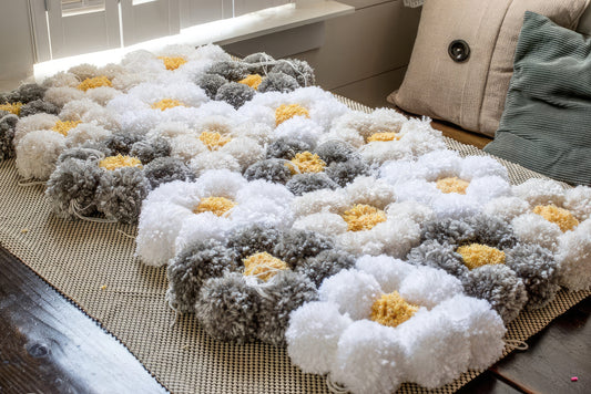 DIY: Crafting a pom pom rug has never been simpler