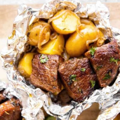 Garlic butter steak and potato foil packets - Camping recipe