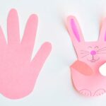 Making bunnies with paper handprints