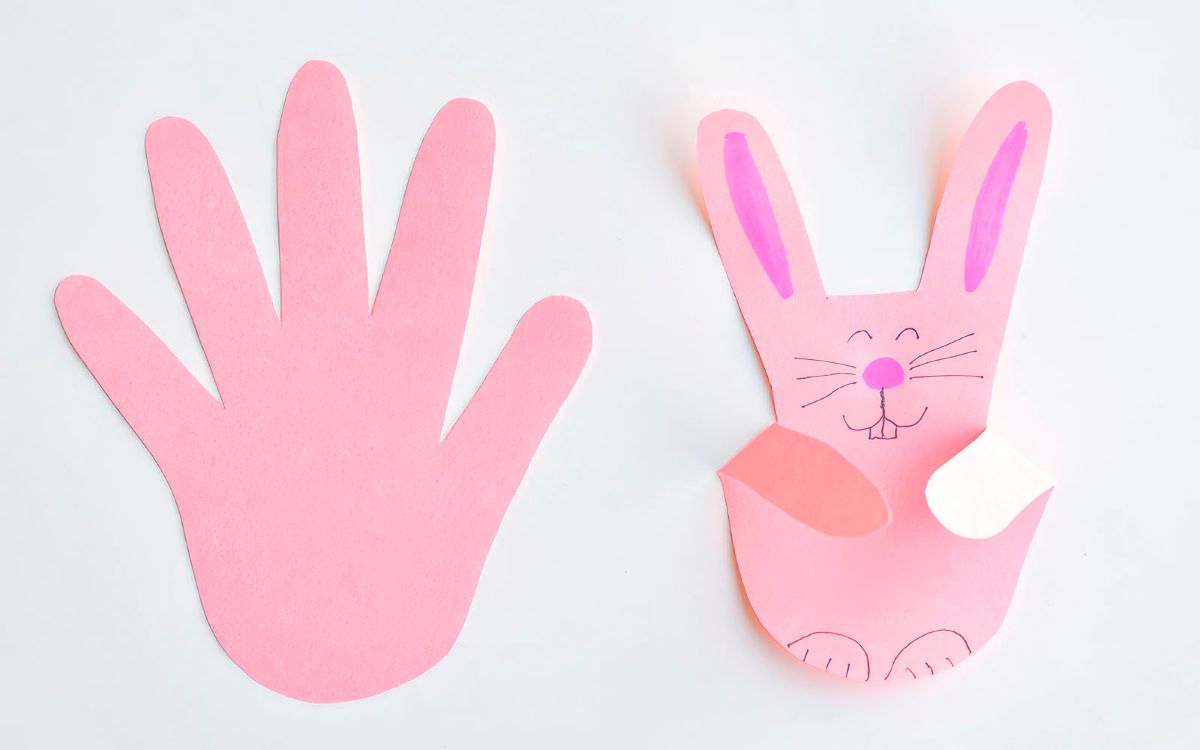 Making bunnies with paper handprints