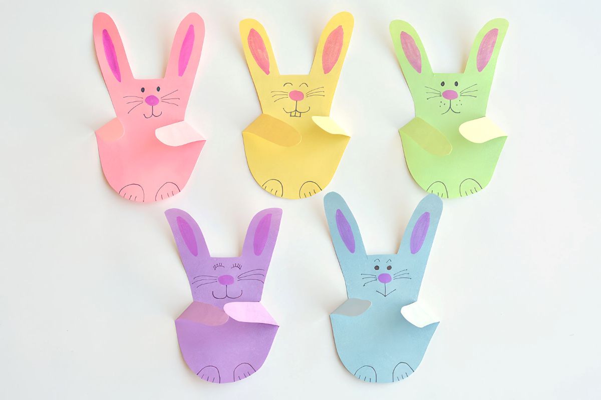 Making-bunnies-with-paper-handprints-3