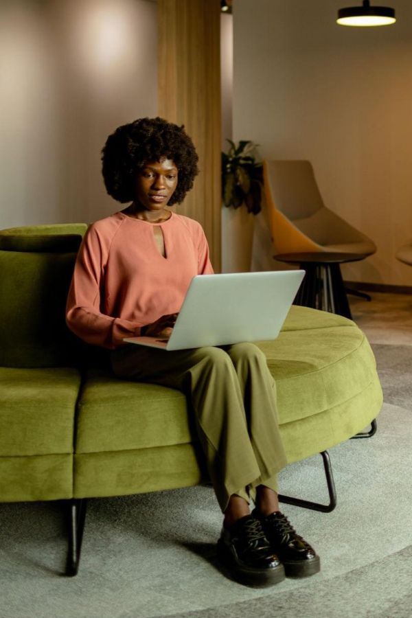 Rounded afro hairstyle with defined curls, business professional hairstyles for women natural hair