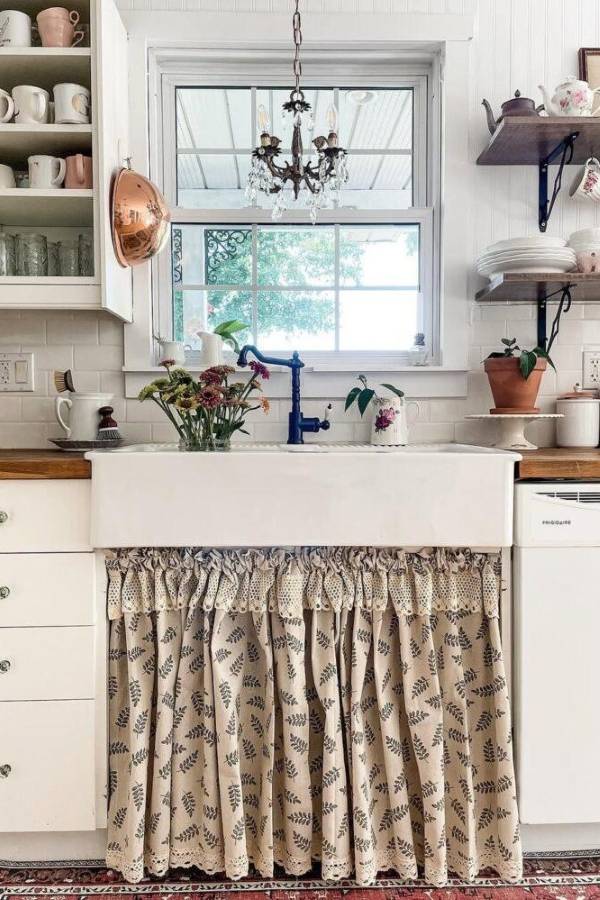 A soft curtain bringing warmth and flow into the kitchen space