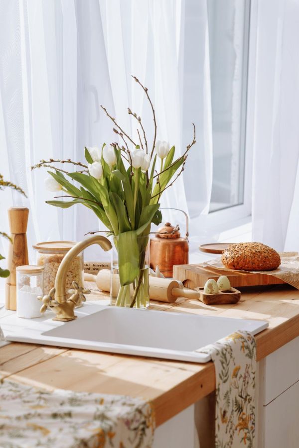 A warm counter layered in soft light and quiet textures