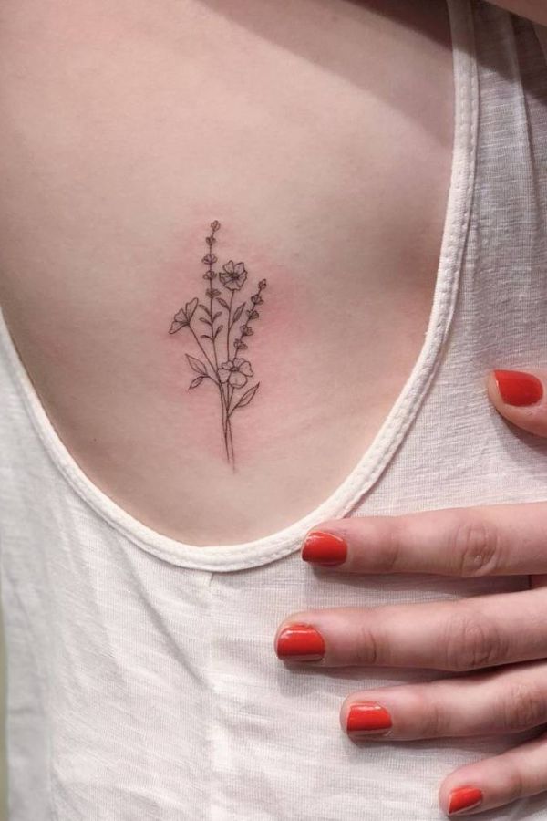 Small flower Side Boob Tattoo