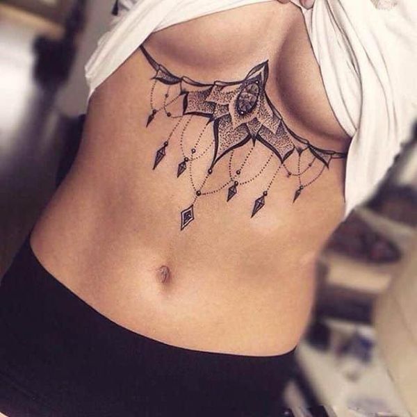 Sternum and Underboob Bold Tattoo Blackwork Design