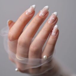 Elegant nail designs for weddings with white French tips and pearl accents on almond nails - Tee Art Online