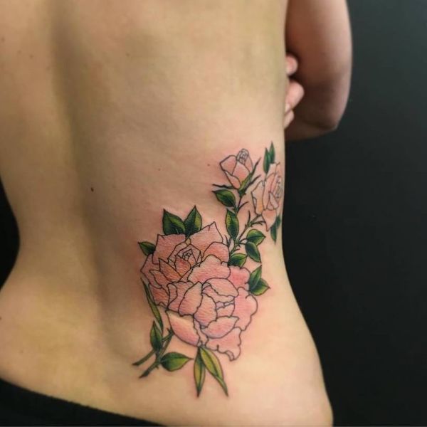 Pink peony flower tattoo on the side waist with soft shading