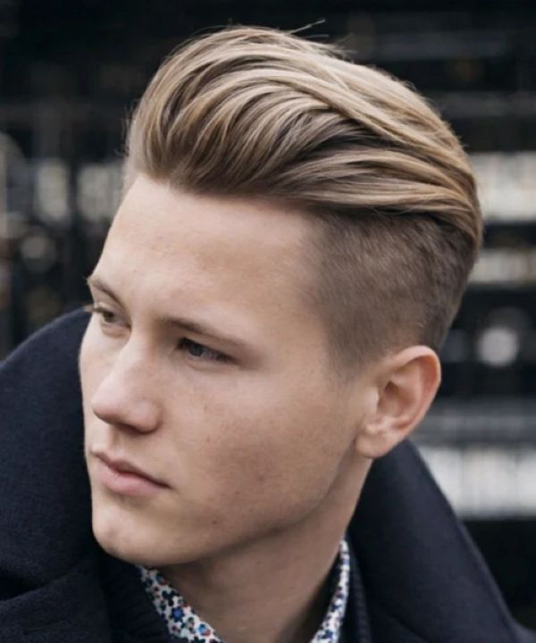 Side-swept directional flow hairstyle men straight hair long top clean fade sleek volume