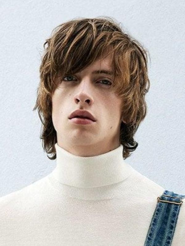 Modern wolf haircut men straight hair medium length shaggy layers messy texture natural volume