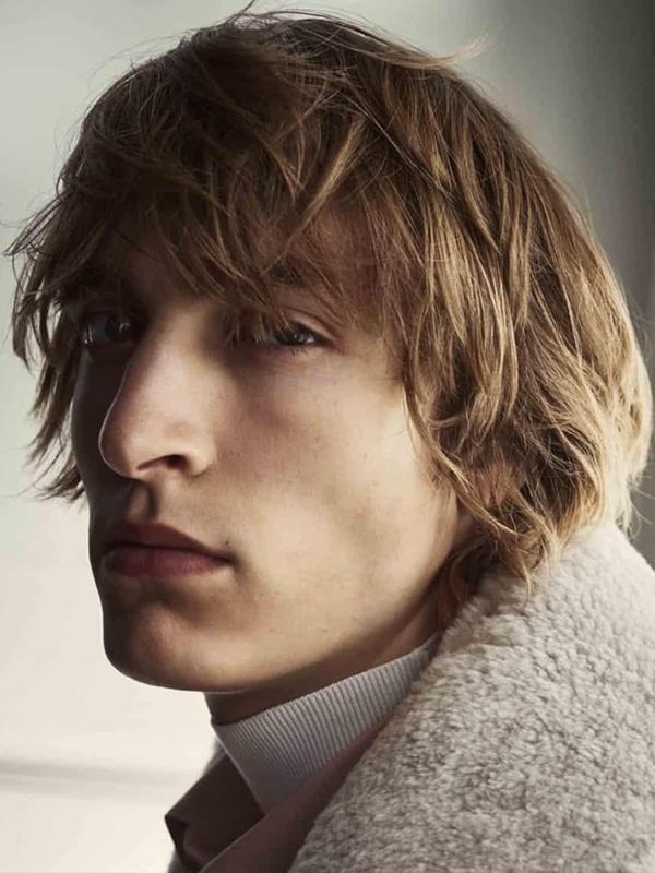 medium length straight hair men soft layered shag natural texture light volume face framing