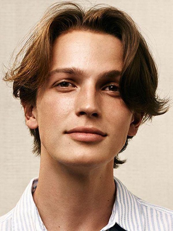 Face-framing curtain shape men straight hair medium length soft layers middle part natural flow