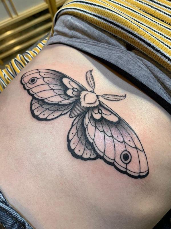 Double wing moth tattoo