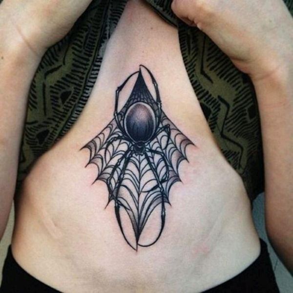 Smoky black and grey spiderweb sternum tattoo with bold spider centerpiece - teeartonline.com