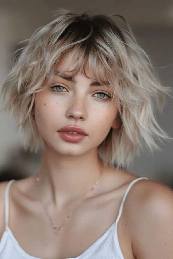 Platinum wolf cut with airy fairy texture