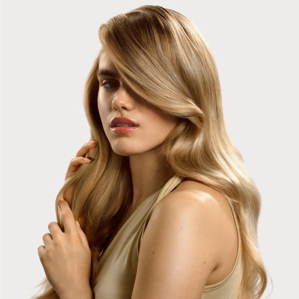 Easy Fairy Hairstyles with sleek blonde waves and glass-like shine