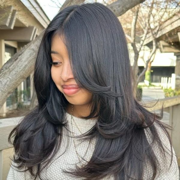 soft black butterfly layers and airy volume