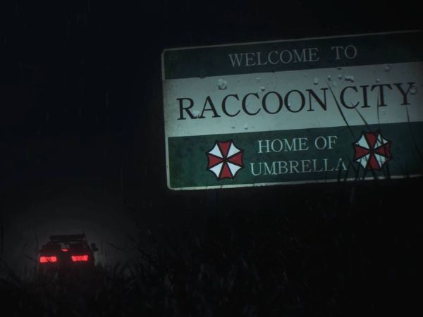 Welcome to Raccoon City sign in Resident Evil 2 Remake at night with rain, Umbrella logo visible, car headlights in the distance